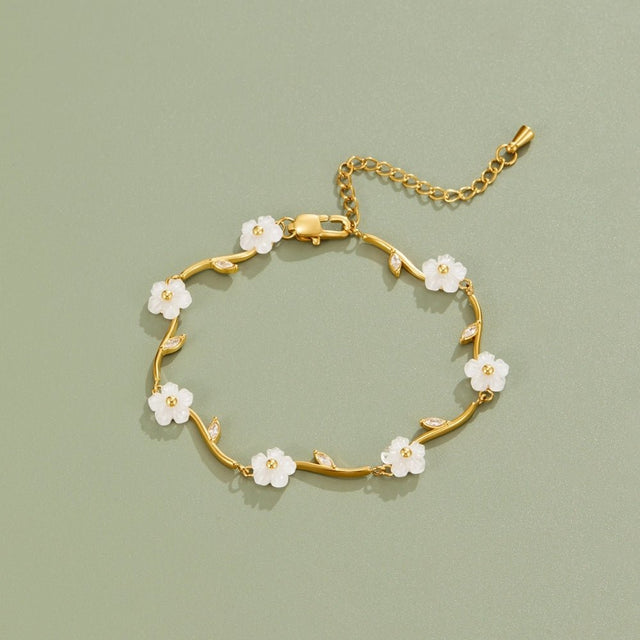 Pulseira Flor com Pérola Branca Dourada